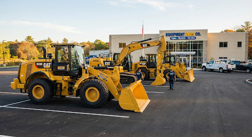 Heavy modern industrial wheel loader and yellow machinery on dealer yard in Northborough Massachusetts
